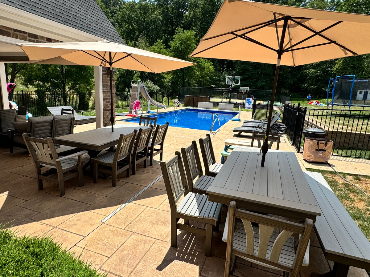 Outdoor dining table with bench that seats eight people