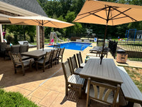 Outdoor dining table with bench that seats eight people