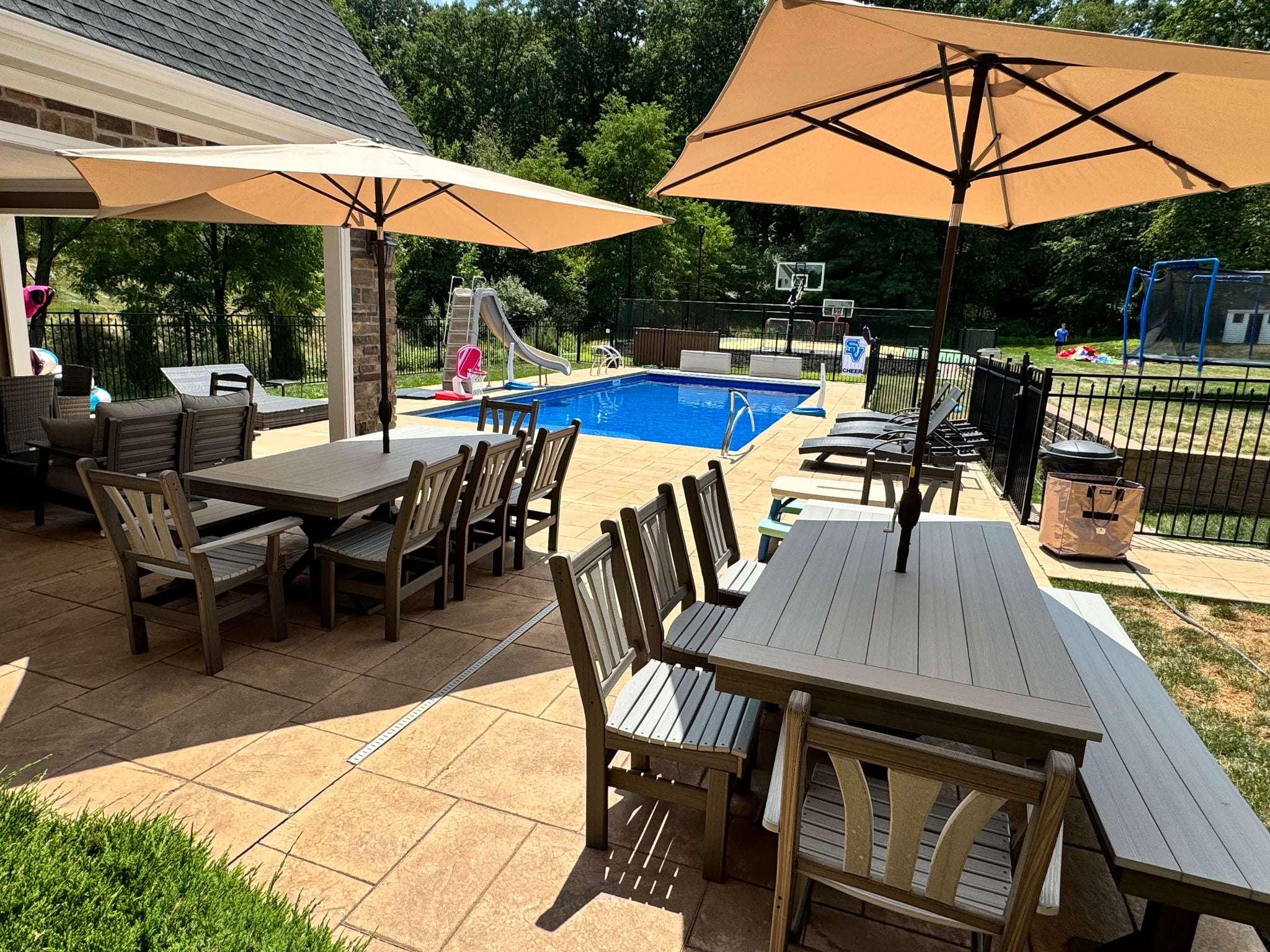 Outdoor dining table with bench that seats eight people
