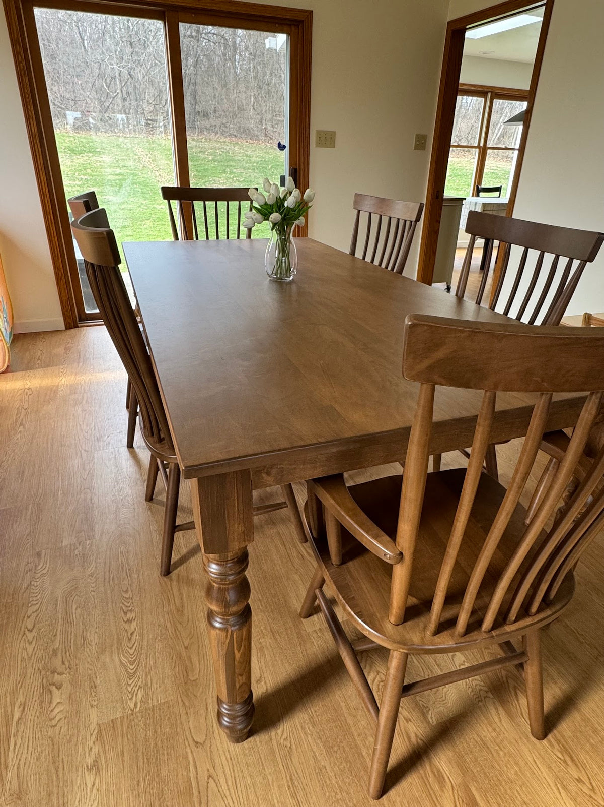 Spindle farmhouse table with Copenhagen chairs in Early American stain, built for Hannah