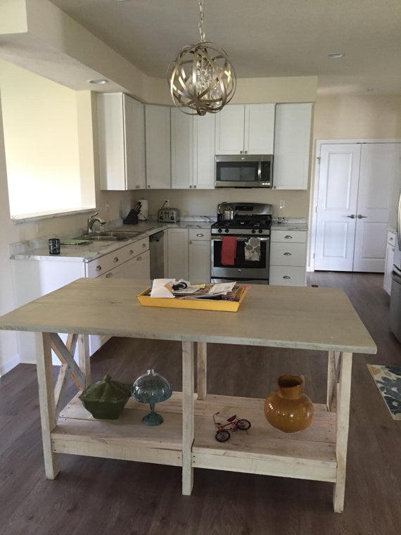 Our rustic farmhouse kitchen island made using reclaimed barn wood from Pennsylvania barns and kiln dried rough cut maple. Wooden Whale Workshop Custom Furniture, Butler, PA ready to ship and custom woodwork.Unique and beautiful. Great prices.