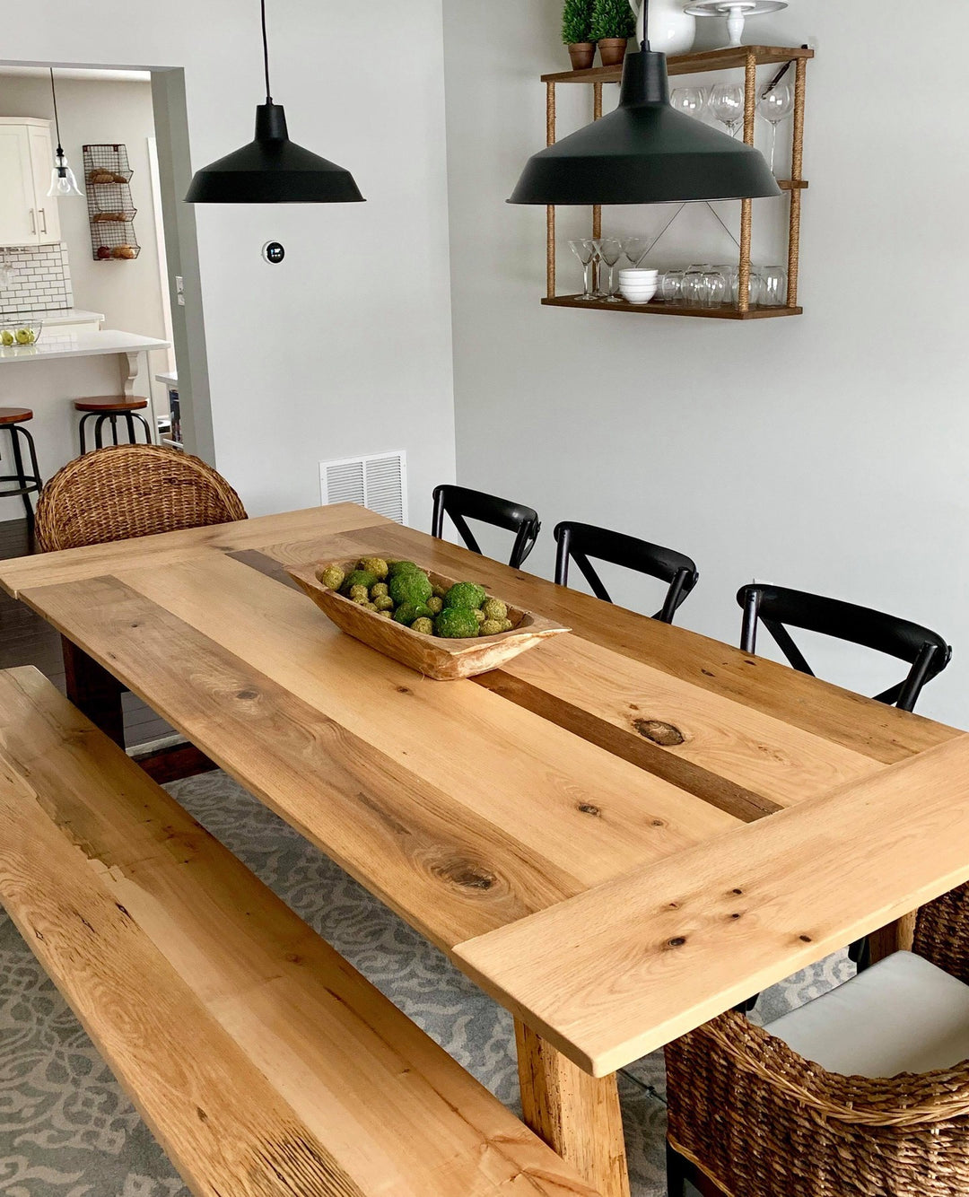 Rustic natural wood dining table with a bench